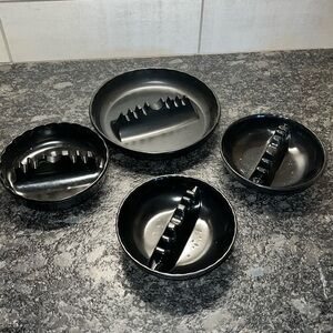 Set of 4  black melamine ash trays. Look to be new. Great gift!  7”& 4”